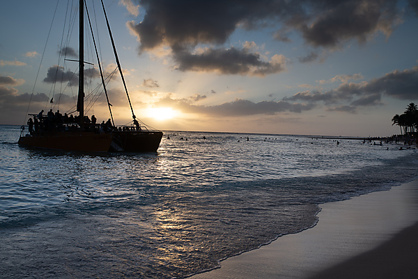 Catamaran Departing at Sunset